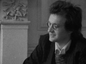 Wim Wenders listens to Charlie (Charles Gormley)'s pitch in Maurice Hatton's Long Shot (1977)