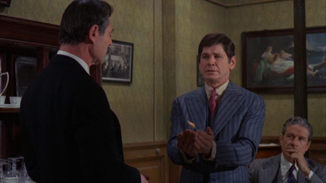 Joe (Charles Bronson) is initiated into the Family in Terence Young's The Valachi Papers (1972)