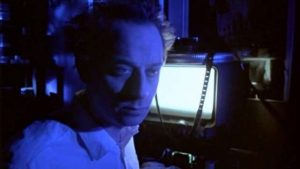 Johan Rudebeck as a film editor driven mad by cheap gore and sex in Anders Jacobsson's Evil Ed (1995)