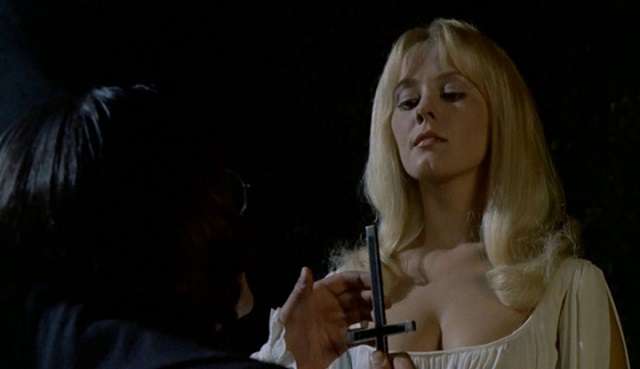 Carmilla (Yutte Stensgaard) humiliates teacher Ralph Bates in Jimmy Sangster's Lust for a Vampire (1971) 
