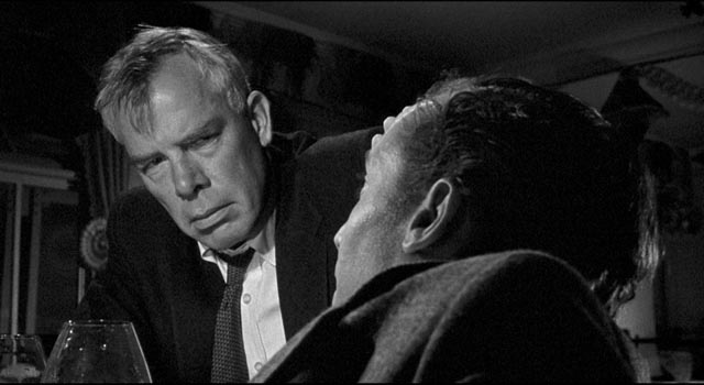 Bill Tenny, a bitter loser (Lee Marvin), and Karl Glocken, a wry observer (Michael Dunn), sail towards disaster together in Stanley Kramer's Ship of Fools (1965)