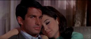 Jim Tanner (George Hamilton) and Margery Lansing (Suzanne Pleshette) hide out at an all-night swingers party in Byron Haskin's The Power (1968)