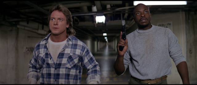 Roddy Piper and Keith David take on alien invaders in John Carpenter's They Live (1988)