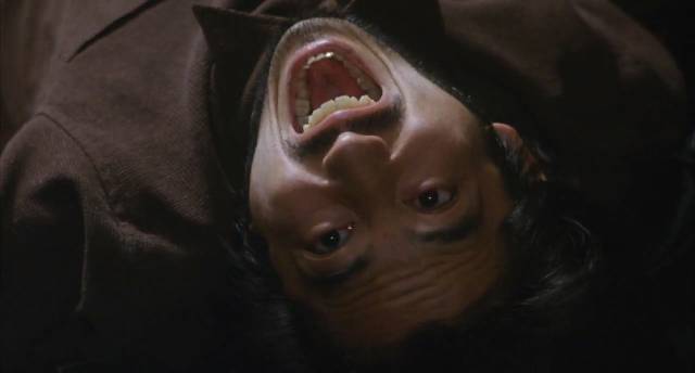 ... and scares Ryuji (Hiroyuki Sanada) to death in Hideo Nakata's Rinhu (1998)