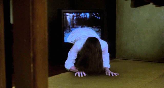 Sadako (Rie Ino’o) crawls out of the TV in Hideo Nakata's Ringu (1998)