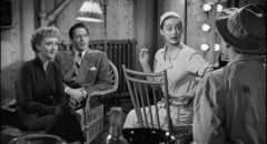 Margot (Bette Davis), Lloyd Richards (Hugh Marlowe) and Karen (Celeste Holm) are enthralled by Eve (Anne Baxter)'s sad life story in Joseph L. Mankiewicz's All About Eve (1950)