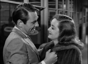 Bill (Gary Merrill), although younger, doesn't take Margot (Bette Davis)'s fear about age seriously in Joseph L. Mankiewicz's All About Eve (1950)