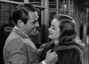 Bill (Gary Merrill), although younger, doesn't take Margot (Bette Davis)'s fear about age seriously in Joseph L. Mankiewicz's All About Eve (1950)