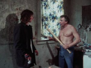 Goose (Jim Van Bebber) visits his junkie father (Charlie Goetz) in Deadbeat at Dawn (1988)