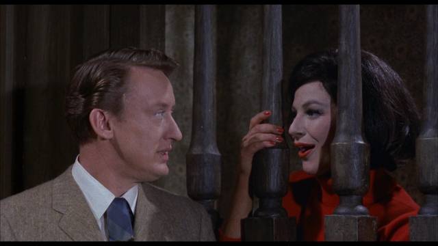Tom Penderel (Tom Poston) is pursued aggressively by Morgana Femm (Fenella Fielding) in William Castle's The Old Dark House (1963)