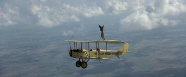 Waldo and Axel (Bo Svenson) practive wing-walking in George Roy Hill's The Great Waldo Pepper (1975)