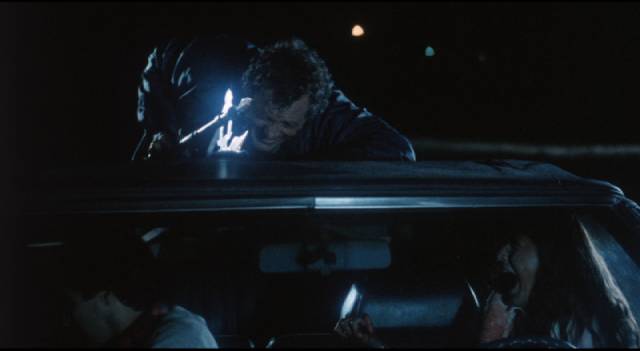 A killer attacks college students at a beach house in Buddy Cooper’s The Mutilator (1984)