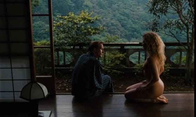 Sam (William Hurt) and Claire (Solveig Dommartin) pause for recovery in Japan in Wim Wenders' Until the End of the World (1991)