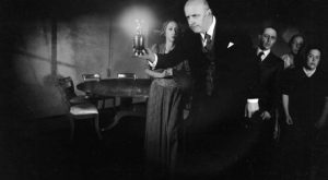 The seance conjures mysterious noises in Ashley Thorpe's Borley Rectory (2017)