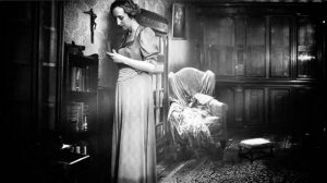 Vicar's wife Mabel Smith (Claire Louise Amias) discovers something odd in Ashley Thorpe's Borley Rectory (2017)...