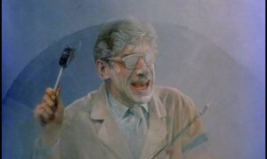 Dr. Hubertus (Michael Fox) trapped in his own freezer in Herbert L. Strock's Gog (1954)