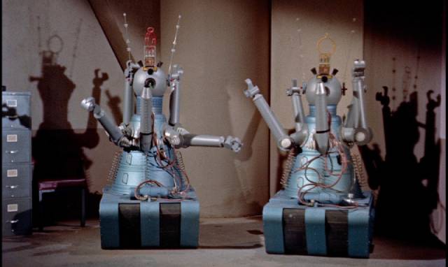 The robots Gog and Magog are being controlled by sinister forces in Herbert L. Strock's Gog (1954)