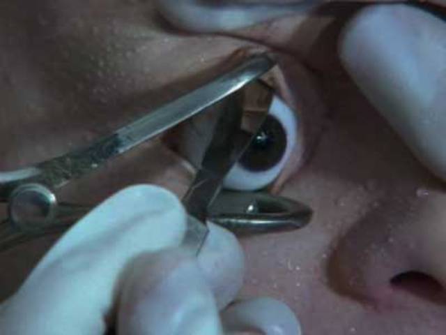 Schramm (Florian Koerner von Gustorf) imagines his eye being cut out in Jörg Buttgereit’s Schramm (1993)