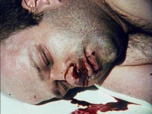 Serial killer Lothar Schramm (Florian Koerner von Gustorf) dies in a domestic mishap in Jörg Buttgereit’s Schramm (1993)