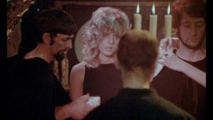 Penny (Penny Beecham) begins her initiation into the craft in Derek Ford's Secret Rites (1971)