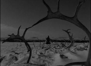 Pirita (Mirjami Kuosmanen) visits a sacred rock to make her sacrifice in Erik Blomberg's The White Reindeer (1952)