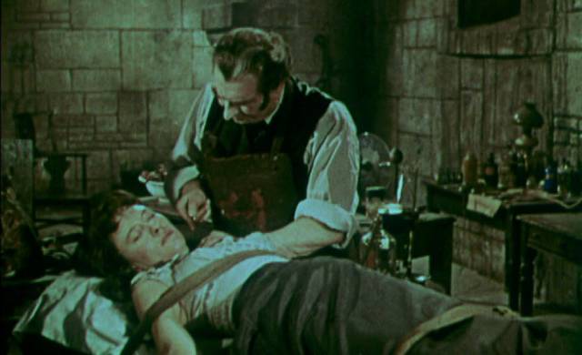 Callistratus (Donald Wolfitt) performs blood experiments to prolong his own life in Henry Cass' Blood of the Vampire (1958)