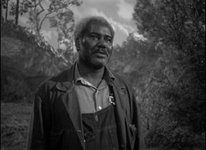 Mose (Rex Ingram) watches over Danny Hawkins (Dane Clark) as a wise mentor in Frank Borzage's Moonrise (1948)