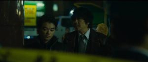 Gangster Yasu (Takahiro Miura) teams up with crooked cop Otomo (Nao Ohmori) in Takashi Miike's First Love (2019)