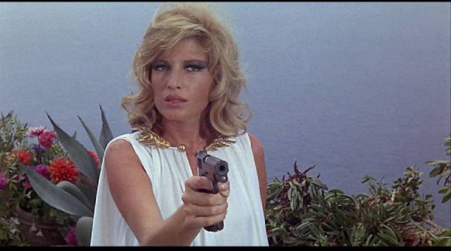 Monica Vitti lets the gun do the acting in Joseph Losey's Modesty Blaise (1966)