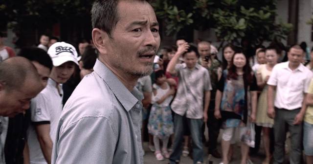 Lao Shi (Gang Chen) tries to do the right thing after a traffic accident in Johnny Ma's Old Stone (2016)