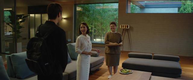 Kim Ki-woo (Choi Woo-sik) meets Mrs. Park (Jo Yeo-jeong) and housekeeper Moon-gwang (Lee Jeong-eun) in Bong Joon-ho's Parasite (2019)