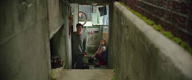The Kims live in a slum basement in Bong Joon-ho's Parasite (2019)...