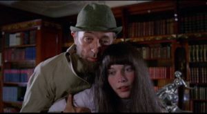Stepfather Albert (Robert Mitchum) tries to reignite an incestuous relationship with Cenci (Mia Farrow) in Joseph Losey's Secret Ceremony (1968)