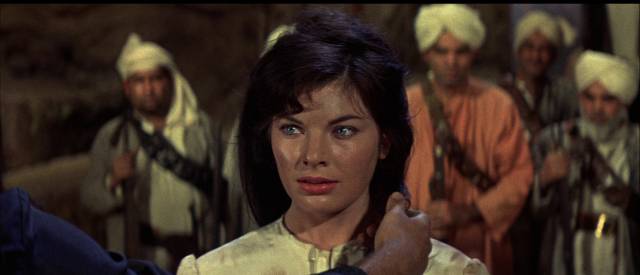 Officer's wife Elsa Connelly (Katherine Woodville) is captured by the rebels in John Gilling's The Brigand of Kandahar (1965)