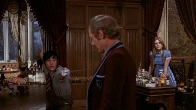 Sonny (Howard Trevor) doesn't like New Friend (Michael Bryant) in Freddie Francis' Mumsy, Nanny, Sonny & Girly (1970)