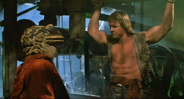 Roddy Piper is captured by amphibian mutants in R.J. Kizer & Donald G. Jackson's Hell Comes to Frogtown (1988)
