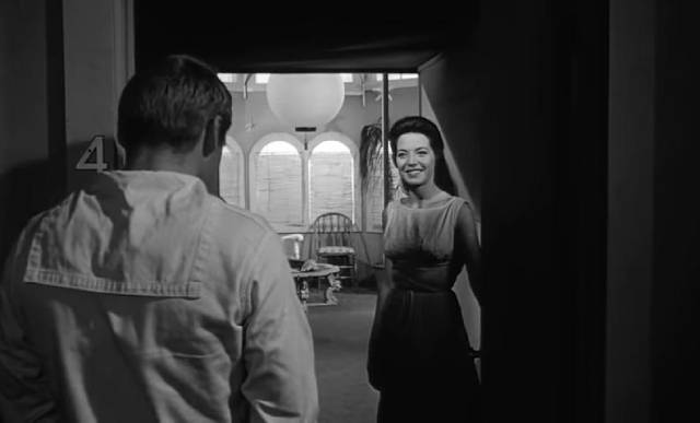 Johnny (Dennis Hopper) is drawn to mysterious sideshow performer Mora (Linda Lawson) in Curtis Harrington's Night Tide (1961)