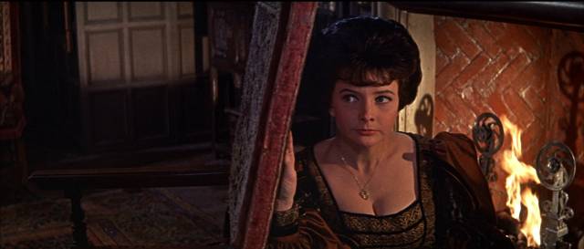 Clare Judd (June Thorburn) overhears secret plans in John Gilling's The Scarlet Blade (1063)