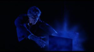Dr. Scott Nelson (Robert Lansing) looks for something inside the reactor in Irvin S. Yeaworth Jr's 4D Man (1959)