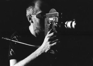 Director Kenneth George Godwin lining up an effects shot with the hand-wound Bolex