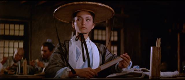 Golden Swallow (Cheng Pei-pei) is taken for a man by the people at the inn in King Hu's Come Drink With Me (1966)