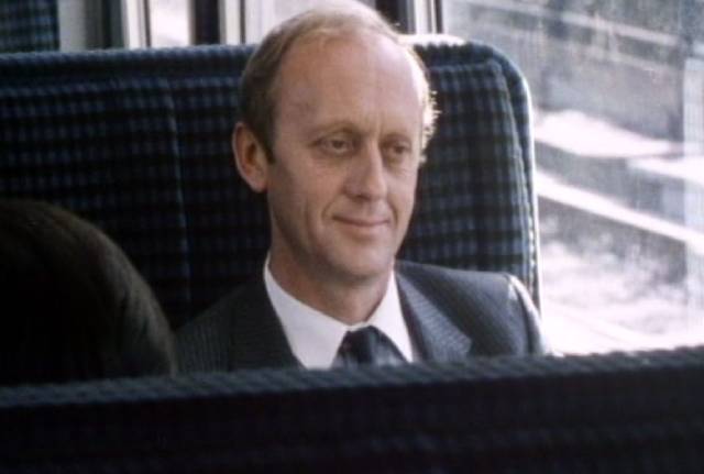 The Traveller (Kenneth Colley) on his commute to work in Ray Davies' Return to Waterloo (1984)