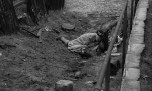 Mrs Ross (Edith Evans) is dumped in an alley by the Noonans in Bryan Forbes' The Whisperers (1967)