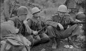 Real soldiers playing movie soldiers in Owen Crump's Cease Fire (1953)