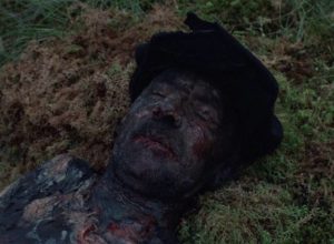 An old man burned and left to die by the Germans in Elem Klimov's Come and See (1985)