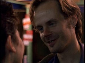 Sam (Larry Fessenden) meets the enigmatic Anna (Meredith Snaider) at a party in Larry Fessenden's Habit (1995)