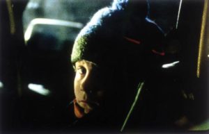 Miles (Erik Per Sullivan), faced with violent adult conflicts, has visions of the Wendigo in Larry Fessenden's Wendigo (2001)