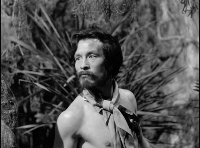 Kusatabe (Tadashi Suganuma) becomes jealous of the attention paid to Keiko (Akemi Negishi) by the sailors in Josef Von Sternerg's The Saga of Anatahan (1953)