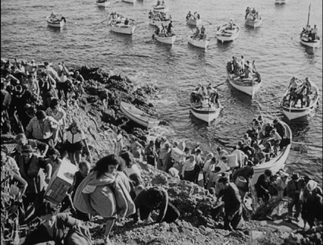 People come to the island from all over the world looking for freedom in Leo Joannon's Atoll K (1951)