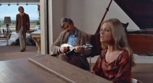 The dying Santonix (Per Oscarsson) enjoys a musical interlude with Ellie (Hayley Mills) in Sidney Gilliat's Endless Night (1972)